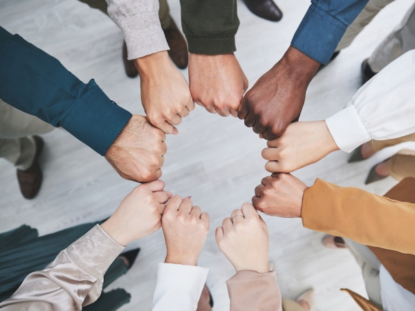 Hands, fist bump and team, support with solidarity and business people with top view and community. Synergy, cooperation and huddle, collaboration and corporate group with trust, meeting and mission Hands, fist bump and team, support with solidarity and business people with top view and community. Synergy, cooperation and huddle, collaboration and corporate group with trust, meeting and mission.